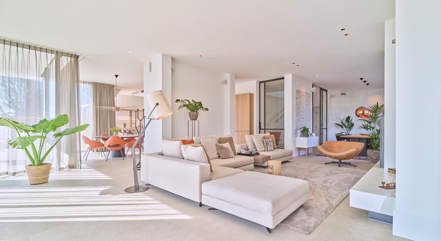 Spacious modern villa living room with Acosorb acoustic ceiling