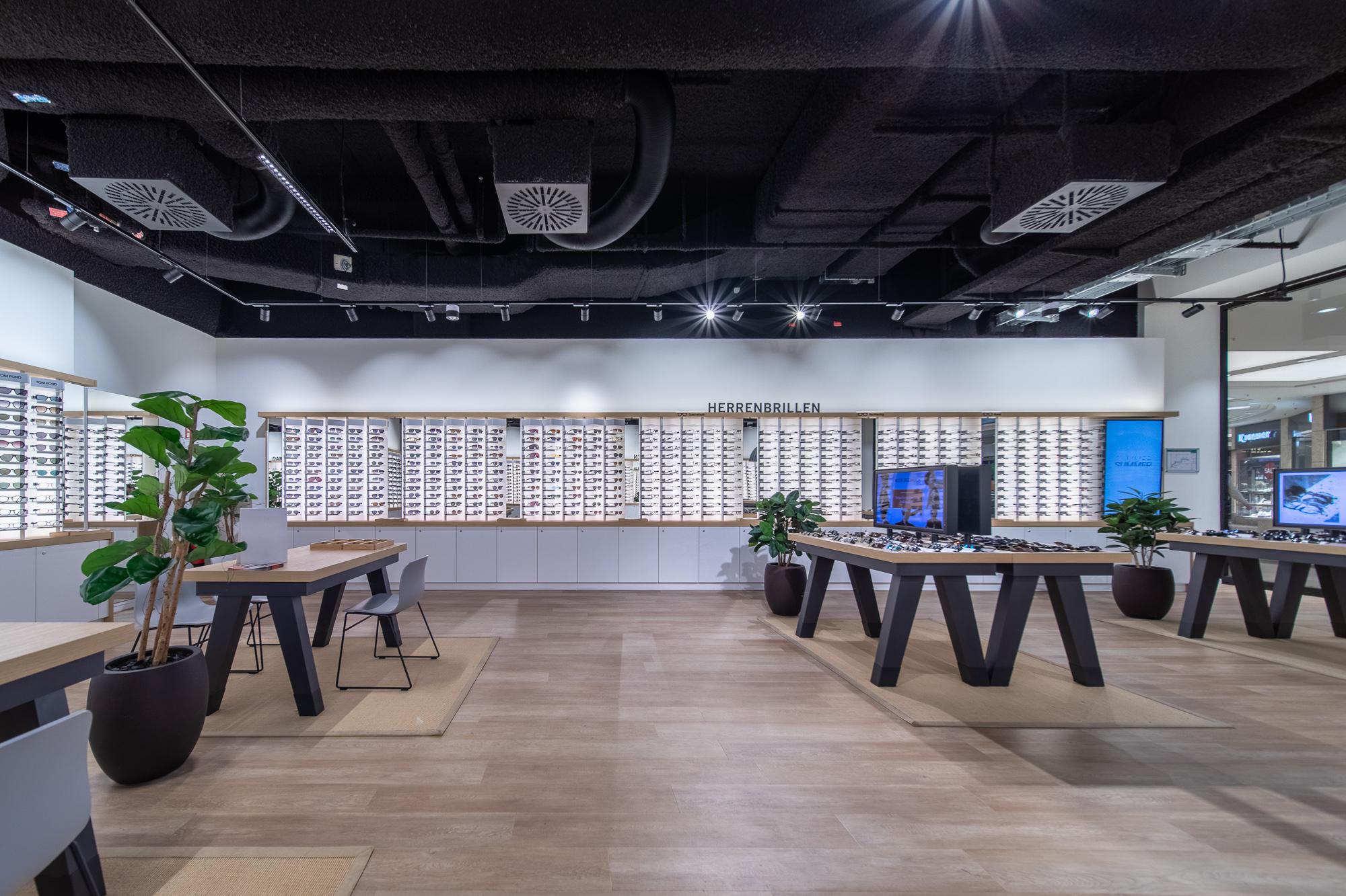 akoestisch spuitwerk plafond retailruimte door Acosorb