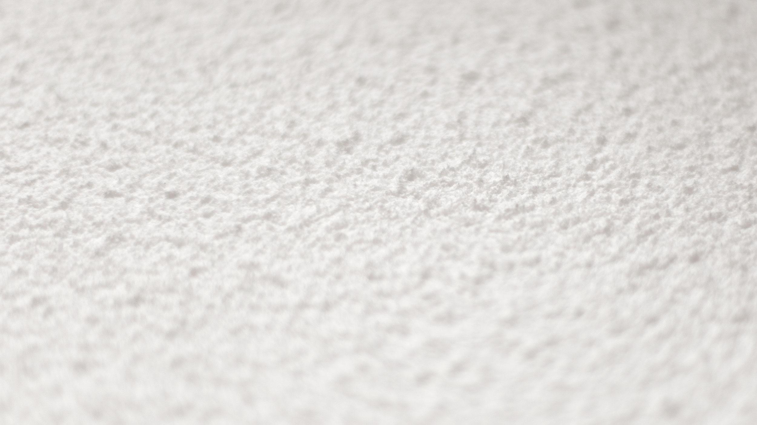 Close-up of Acospray DC1.1 acoustic spray material texture